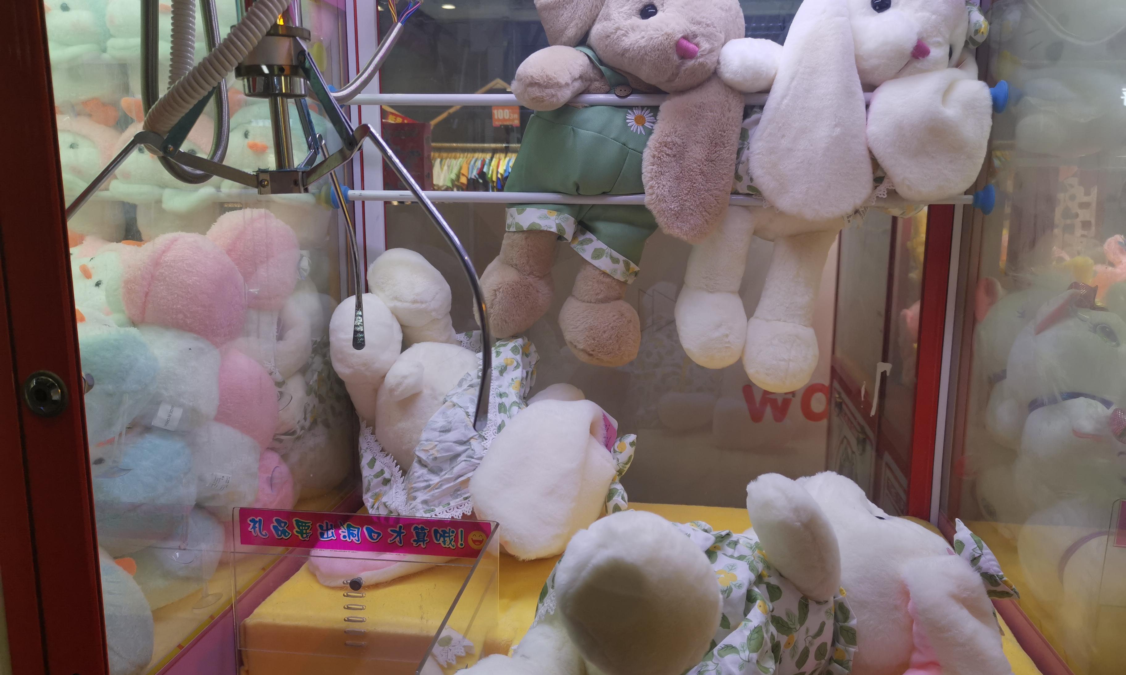 夹娃娃的秘诀和技巧_夹娃娃技巧